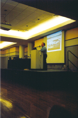 Scott Rogers gives a demonstration of a Web camera used for security